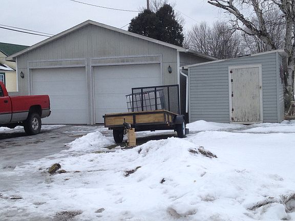 Detached garage and shed