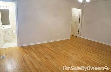 Hardwoods in Bedrooms and Hallways
						:
						Walk-in closet and bathroom in Master