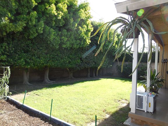 Back yard with planting beds