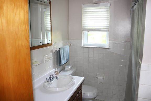Newly remodled bathroom with tub/shower.
