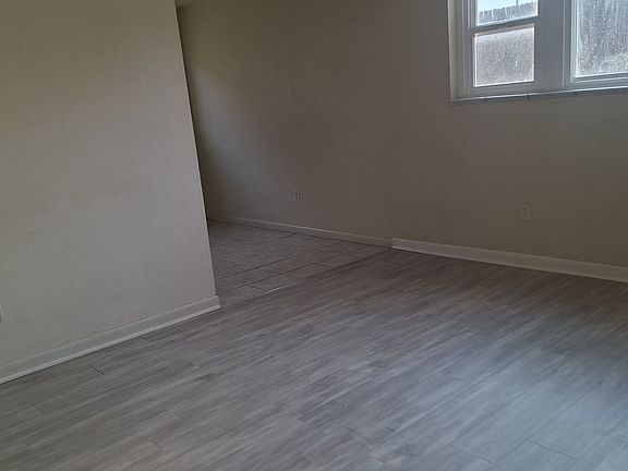 Looking to opposite wall from front door when walking in. Dining room is through entry way.
