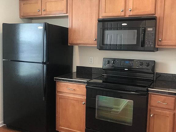 Kitchen with wood flooring
