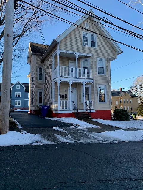 Front of 123 Church Street (Corner of Church St. and Whittlesey St.).