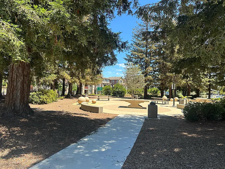 Prime location right across from a sprawling 6.5-acre neighborhood park with picnic spots and BBQ areas.