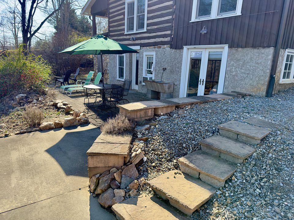 entrance to unit, stairs lead to parking