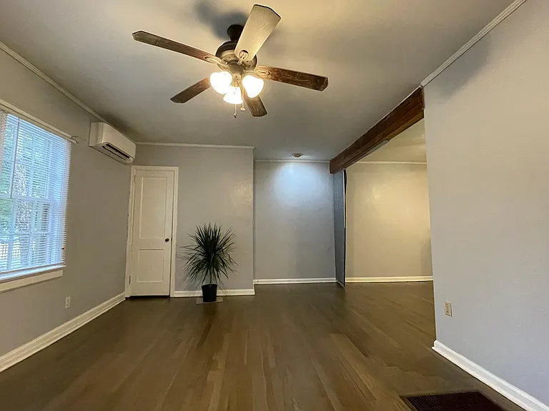 Gray-toned hardwoods_. Note folding wall on right in open position