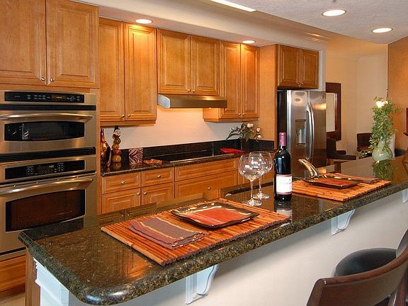 Beautiful granite kitchen counter tops, and stainless steel appliances