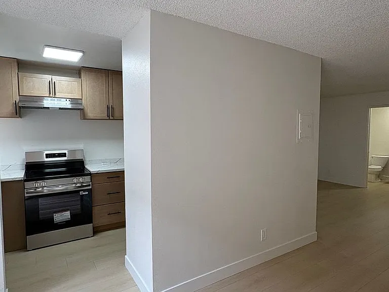 WOD - Woodman Apartments — Photo 1