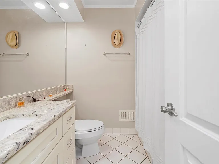 Shared full bathroom with a bathtub on 2nd floor