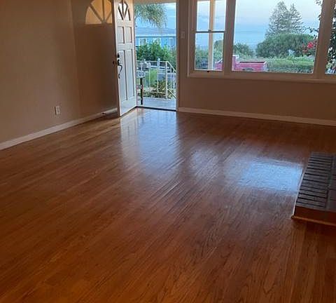 living room with view of bay. NIGHT LIGHTS = AMAZING