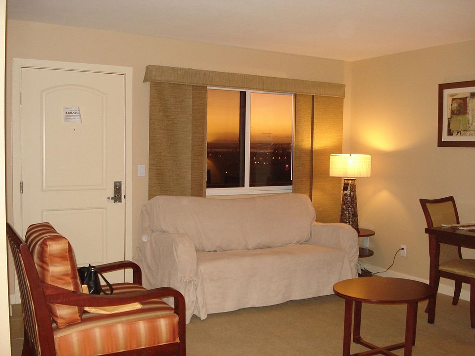 Window covering updated to faux wood blinds.