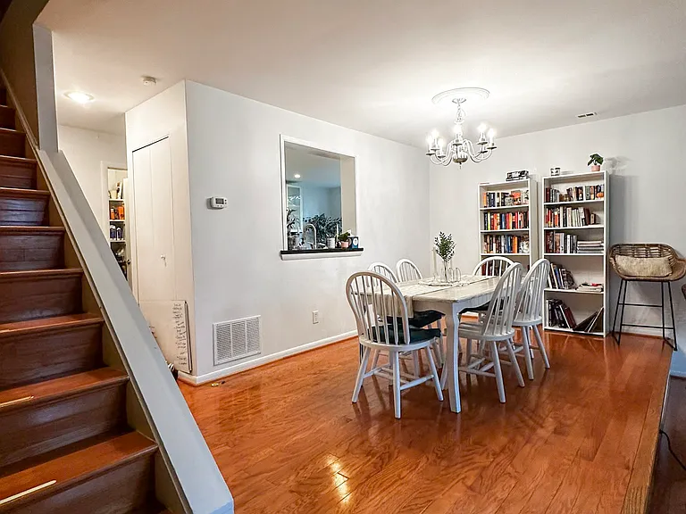 Downstairs dining area between kitchen and sunken living room
