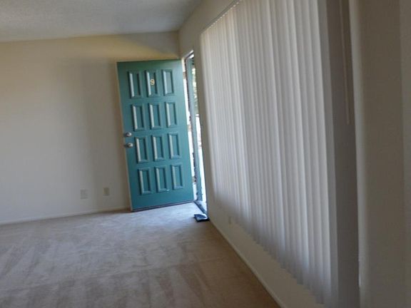 FRONT ENTRY OF THE APARTMENT
INTO THE LIVING ROOM.