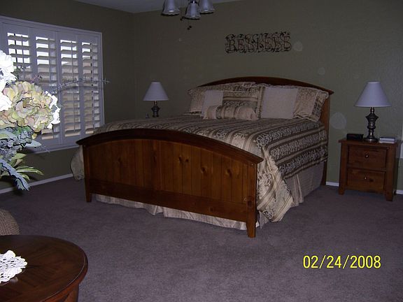 Master Bedroom with plenty of room for sitting area or excercise equpment.