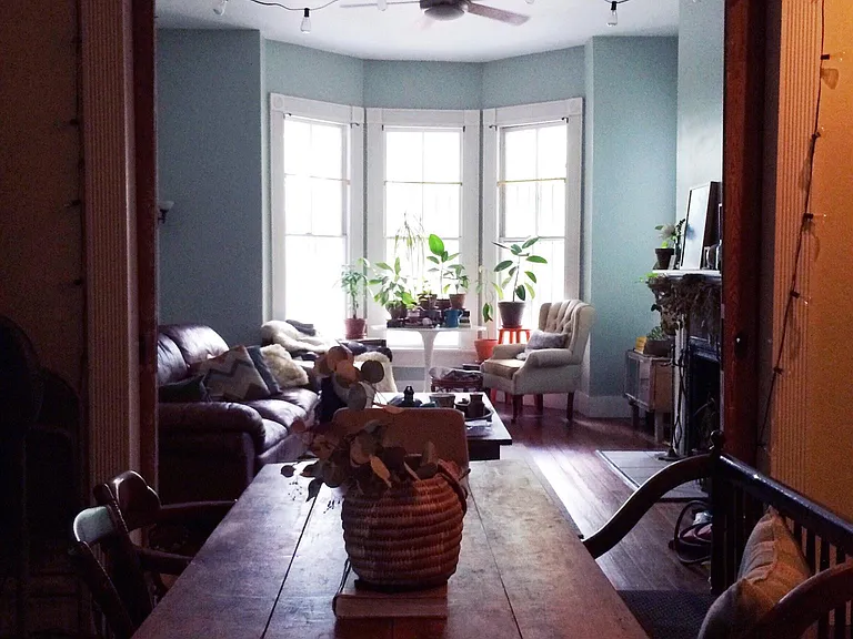 Dining room in foreground, living room in background,