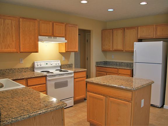 Tons of cabinet space. Center work island.