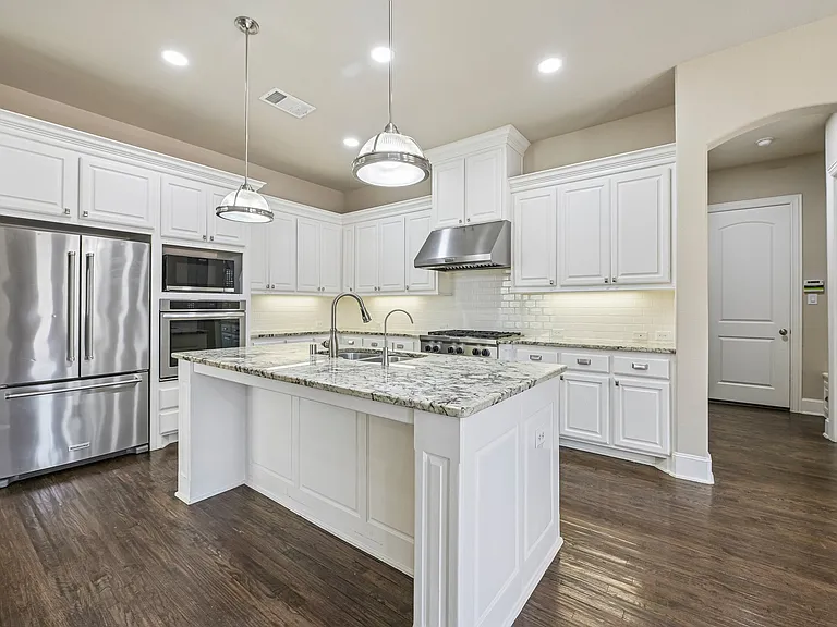 Plenty of cabinet space. Love the 6 burner gas cooktop!