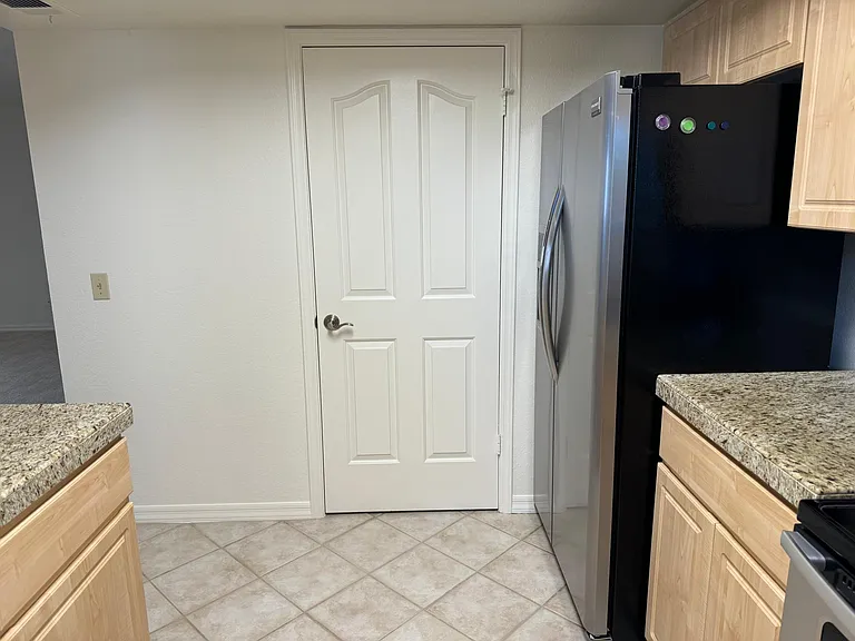 Door to Laundry Room.
