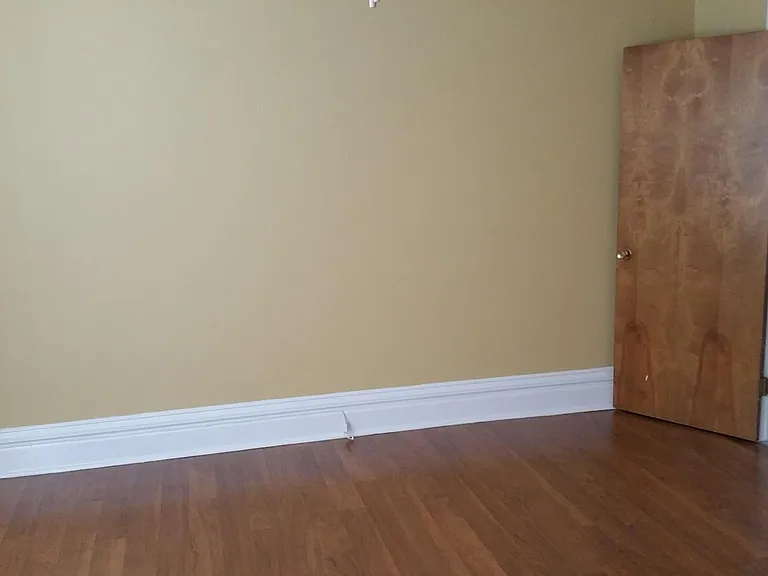 Larger bedroom - toward door.