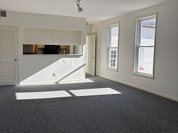 Large living area with tons of sunlight