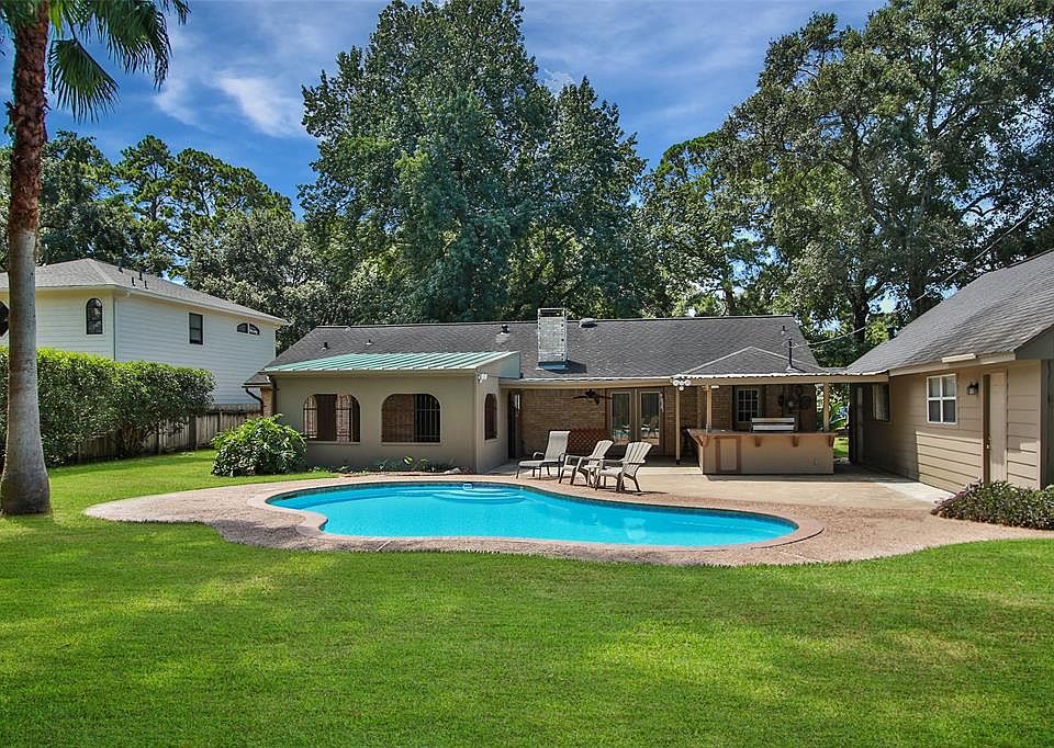 Backyard invites you to unwind, relax and sit a spell.