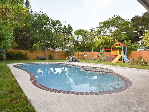 Fenced backyard, great pool