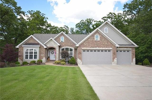 Stately stone & brick front 6 BR, 3.5 BA ranch home wrapped in colorful landscapig, lush green lawn and nestled on your private, 3+acre wooded paradise! Meticulously maintained inside and out!