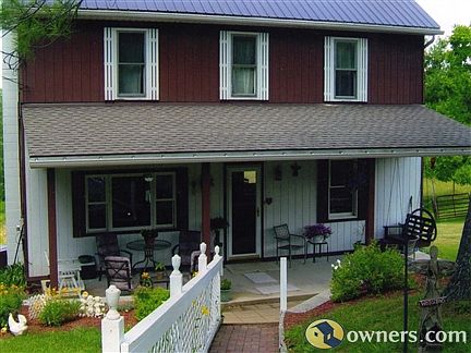 front of house, shows beautiful roof