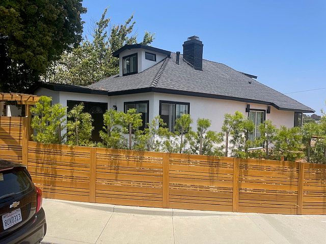 Exterior front with privacy fence