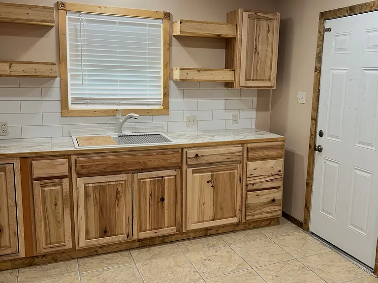 Many cabinets and shelves
