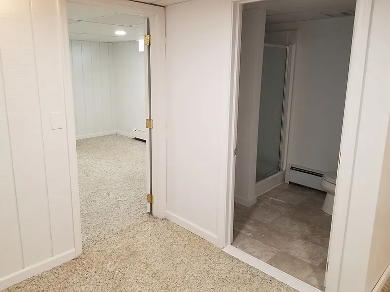 View into Downstairs 3rd bedroom & 2nd full bathroom