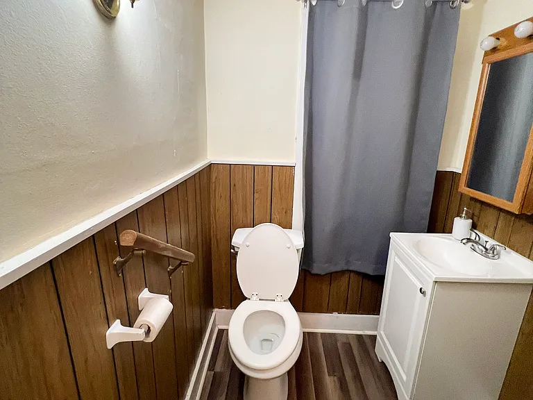 Half Bath located on the 1st floor off of the Laundry Room