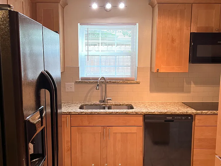 New Cabinets and Granite Counter tops
Refrigerator with Ice Maker is included