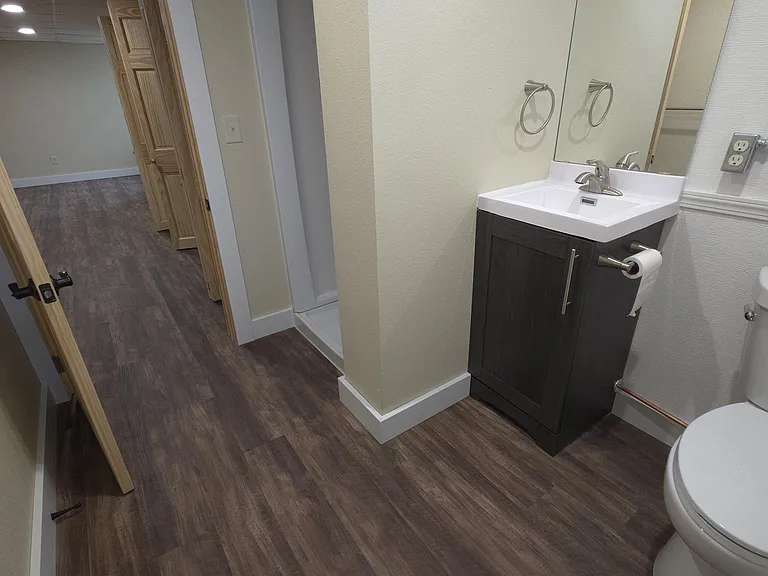 Remodeled full bathroom connected to suite.
