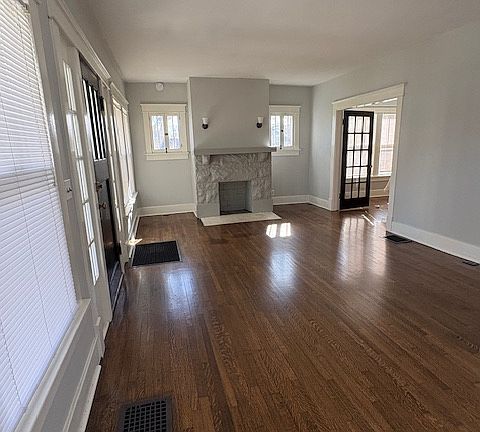 Living Room has decorative fire place.