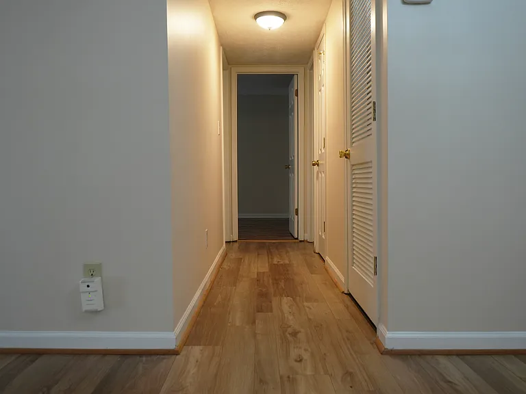 Hallway Leading to the Bedrooms, Bathroom and Laundry room.