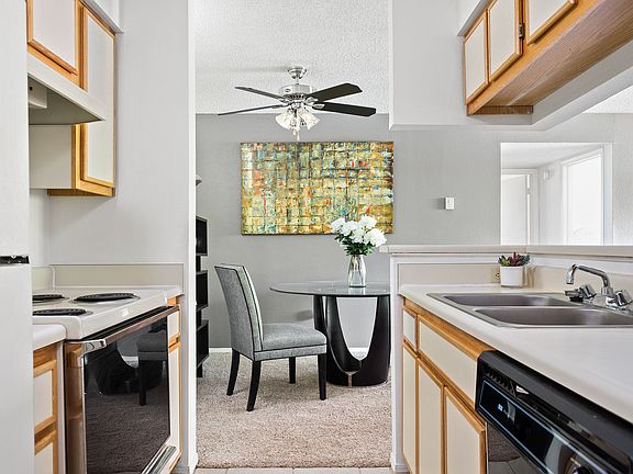 Kitchen with Dishwasher and Living Room View - The Augusta A