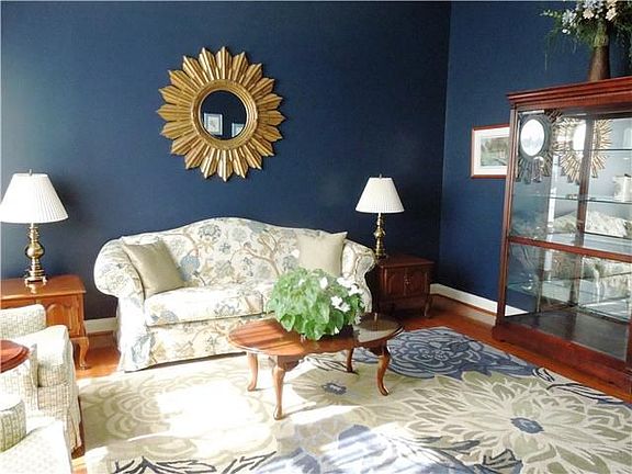 Living Rm w/Hardwood Floors & 12' ceiling