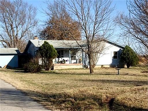 Home and 8 acres zoned Rs3. Ideal location for Residential development.