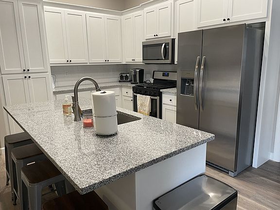 kitchen island with bar stools