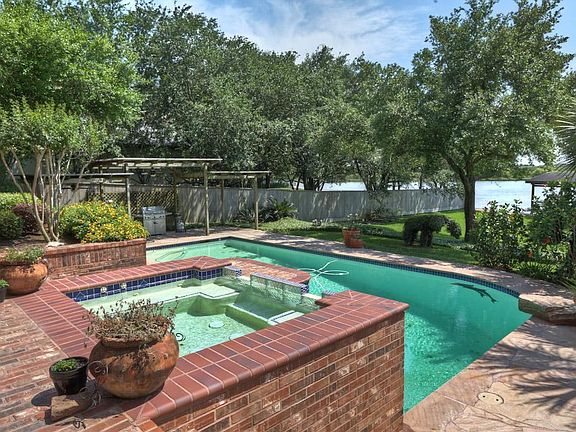 Hot Tub and Pool in your private oasis backyard- almost 2/3 of an acre of prime waterfront land!
