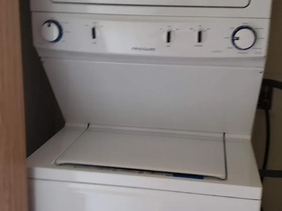 Stackable washer/ dryer in unit