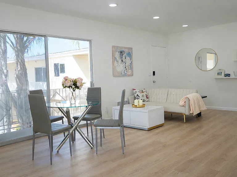 New Hardwood Floors, New Furniture, and New Lighting