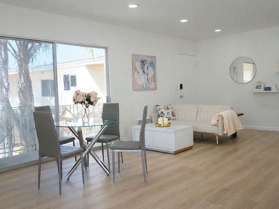 New Hardwood Floors, New Furniture, and New Lighting