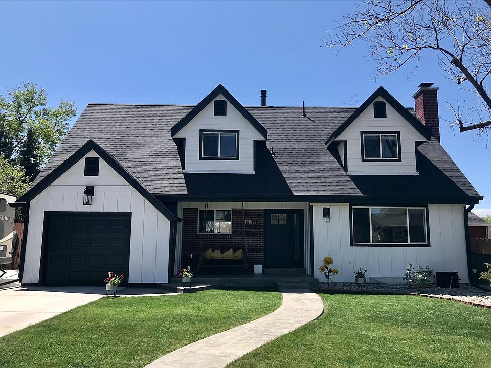 Street view of home, new siding, roof paint and doors