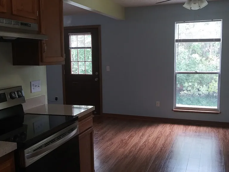 View off the kitchen to dining room and exterior views.