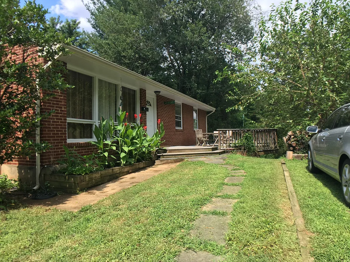 Entry door is just steps from parking and a spacious deck. - 2510 Willard Dr
