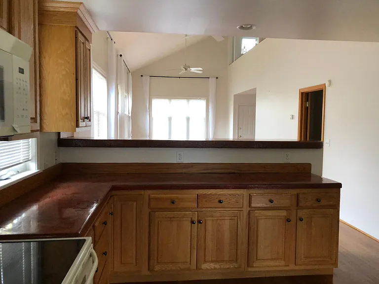 Looking out from the kitchen, into the living room.