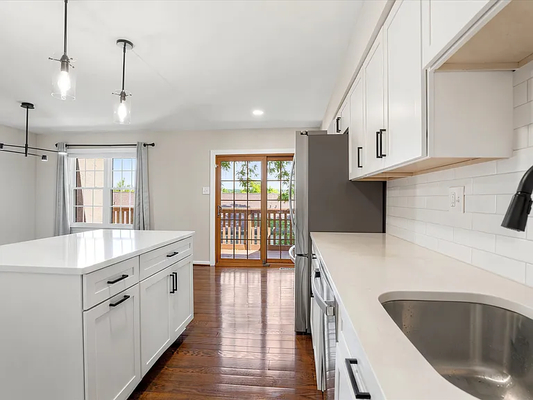 New Kitchen & View of Breakfast Room & Access Deck