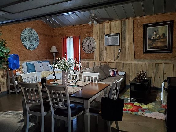 Inside home while furnished. 
Home does NOT come furnished.
